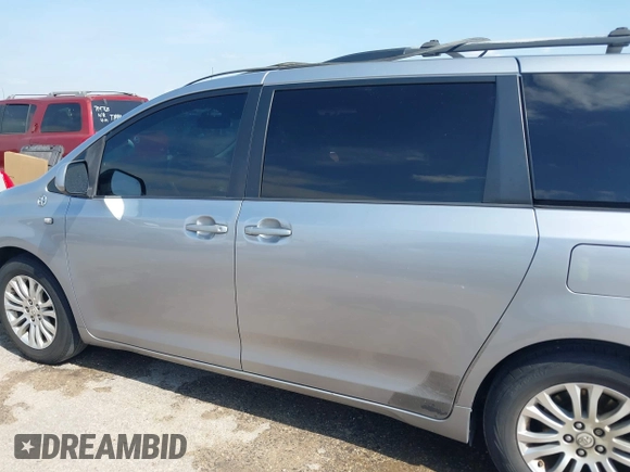 2011 Toyota Sienna XLE AAS with VIN 5TDYK3DC3BS007690, listed as a IAAI auction lot 42044640 with 253,359 mi miles. Bid and sale history available at carsss.com. Image 14.