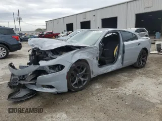 2020 Dodge Charger SXT with VIN 2C3CDXBG6LH192727, listed as a Copart auction lot 46730295 with 58,664 mi miles and Salvage Title. Bid and sale history available at DreamBid. Image 1.