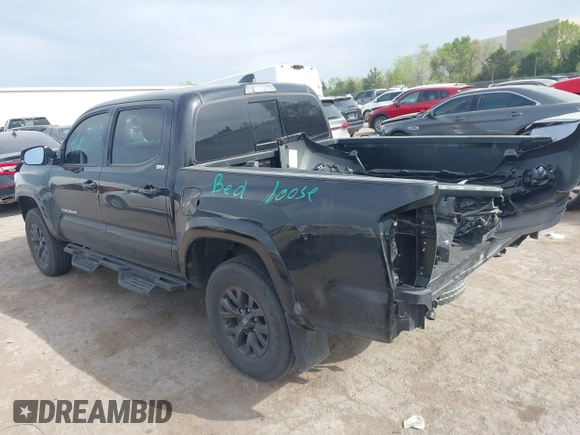 2023 Toyota Tacoma 4WD SR with VIN 3TYCZ5AN4PT170688, listed as a IAAI auction lot 41998053 with 20,770 mi miles. Bid and sale history available at carsss.com. Image 3.
