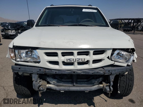 2000 Isuzu Rodeo S with VIN 4S2DM58WXY4302769, listed as a Copart auction lot 70416054 with 150,621 mi miles and Salvage Title. Bid and sale history available at DreamBid. Image 5.
