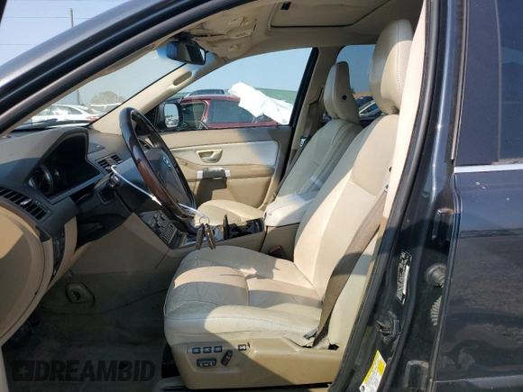 2012 Volvo XC90 with VIN YV4952CZ9C1613695, listed as a Copart auction lot 75767294 with 160,793 mi miles and Salvage Title. Bid and sale history available at carsss.com. Image 7.