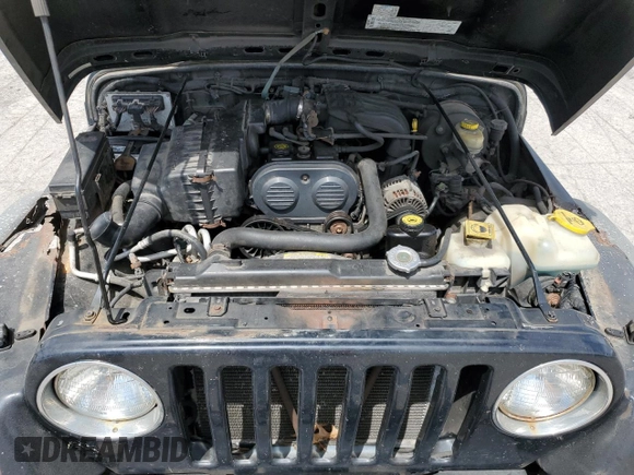 2004 Jeep Wrangler SE with VIN 1J4FA29124P796031, listed as a Copart auction lot 56875525 with 239,488 mi miles and Clean title. Bid and sale history available at DreamBid. Image 11.