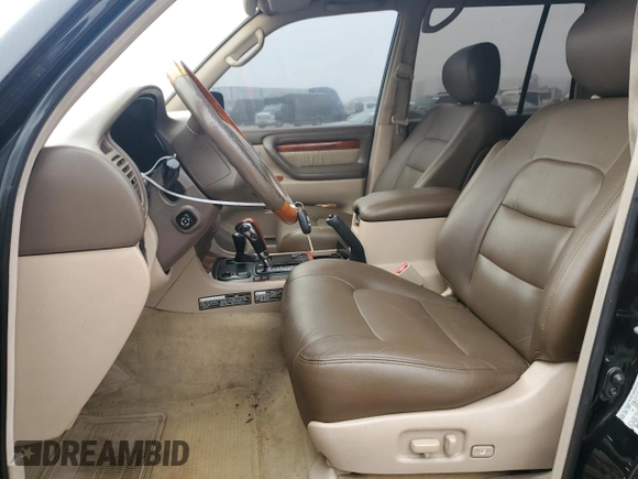 2001 Lexus LX 470 z VIN JTJHT00W513509447, wystawiony jako Copart lot #43988595 z przebiegiem 251 861 mil mil oraz Tytuł czysty. Historia ofert i sprzedaży dostępna na DreamBid. Obrazek 7.