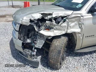 2015 Chevrolet Tahoe LT z VIN 1GNSCBKC7FR140125, wystawiony jako IAAI lot #42279760 z przebiegiem 201 335 mil mil oraz . Historia ofert i sprzedaży dostępna na DreamBid. Obrazek 6.