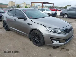 2015 Kia Optima EX z VIN 5XXGN4A7XFG423145, wystawiony jako IAAI lot #42068943 z przebiegiem 113 730 mil mil oraz . Historia ofert i sprzedaży dostępna na DreamBid. Obrazek 1.