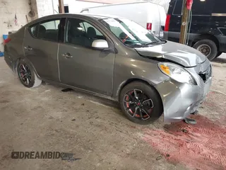 2014 Nissan Versa SV with VIN 3N1CN7AP4EL853890, listed as a IAAI auction lot 41771857 with 99,742 mi miles. Bid and sale history available at carsss.com. Image 1.