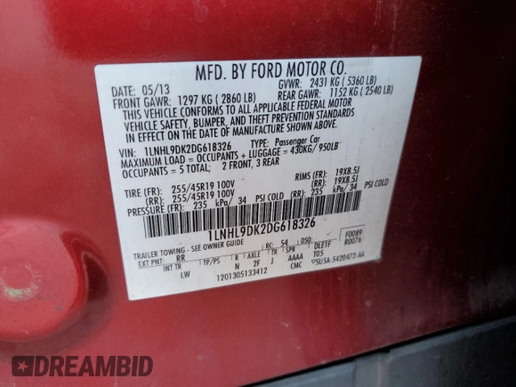 2013 Lincoln MKS z VIN 1LNHL9DK2DG618326, wystawiony jako Copart lot #56875965 z przebiegiem 150 812 mil mil oraz Szkoda całkowita • Salvage title. Historia ofert i sprzedaży dostępna na DreamBid. Obrazek 12.