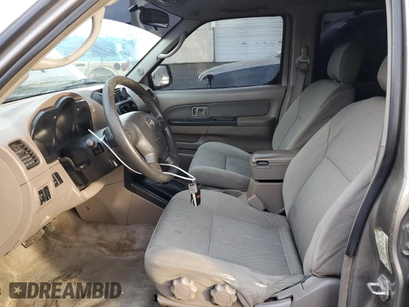 2003 Nissan Frontier XE with VIN 1N6ED29X03C445019, listed as a Copart auction lot 45687565 with 191,290 mi miles and Salvage title. Bid and sale history available at DreamBid. Image 7.