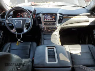 2015 GMC Yukon Denali z VIN 1GKS1CKJ8FR748131, wystawiony jako Copart lot #55213205 z przebiegiem 101 758 mil mil oraz Szkoda całkowita • Salvage title. Historia ofert i sprzedaży dostępna na DreamBid. Obrazek 8.