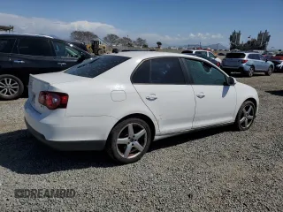 2010 Volkswagen Jetta Limited Edition z VIN 3VWAZ7AJ3AM115147, wystawiony jako Copart lot #52068825 z przebiegiem 154 804 mil mil oraz Szkoda całkowita • Salvage title. Historia ofert i sprzedaży dostępna na DreamBid. Obrazek 3.