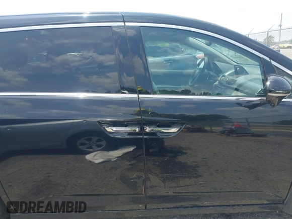 2015 Honda Odyssey Touring Elite with VIN 5FNRL5H90FB003506, listed as a IAAI auction lot 42585049 with 120,543 mi miles and . Bid and sale history available at DreamBid. Image 13.