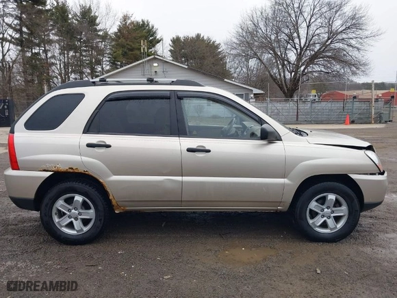 2009 Kia Sportage LX with VIN KNDJE723397628211, listed as a IAAI auction lot 41744526 with 136,811 mi miles. Bid and sale history available at carsss.com. Image 13.