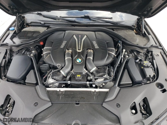 2018 BMW 5 Series M550i xDrive with VIN WBAJB9C57JB034918, listed as a Copart auction lot 51668675 with 94,492 mi miles and Clean Title. Bid and sale history available at carsss.com. Image 11.