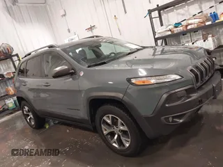 2015 Jeep Cherokee Trailhawk with VIN 1C4PJMBB4FW528633, listed as a IAAI auction lot 42147632 with 166,669 mi miles and . Bid and sale history available at DreamBid. Image 13.