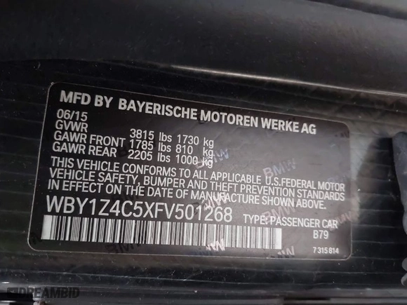 2015 BMW i3 with VIN WBY1Z4C5XFV501268, listed as a IAAI auction lot 41028732 with NaN miles. Bid and sale history available at carsss.com. Image 9.