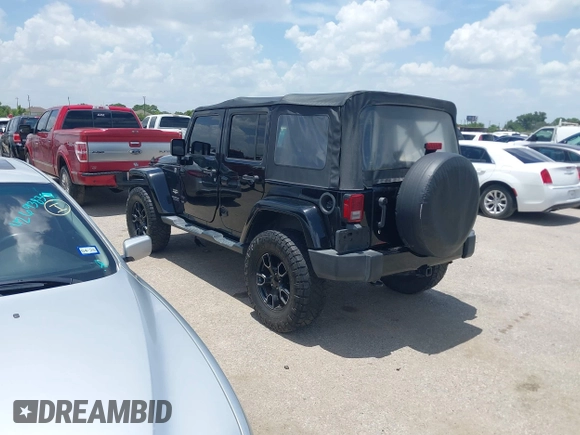2015 Jeep Wrangler Unlimited Sahara with VIN 1C4HJWEG6FL572674, listed as a IAAI auction lot 42736266 with 97,024 mi miles and . Bid and sale history available at DreamBid. Image 3.