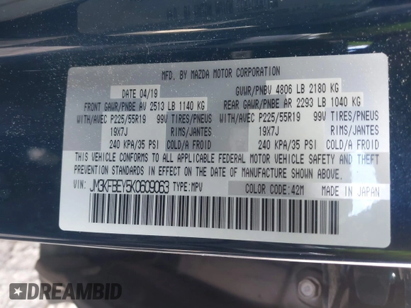 2019 Mazda CX-5 Signature with VIN JM3KFBEY5K0609063, listed as a IAAI auction lot 41802772 with 104,112 mi miles. Bid and sale history available at carsss.com. Image 9.
