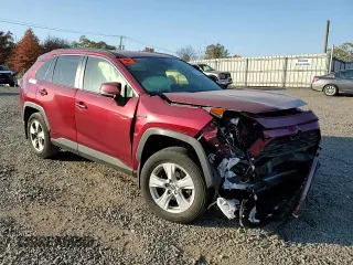 2021 Toyota RAV4 Hybrid XLE with VIN JTMRWRFV7MD130630, listed as a Copart auction lot 76802014 with 0 mi miles and Salvage Title. Bid and sale history available at carsss.com. Image 12.