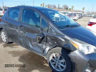 2015 Toyota Yaris L with VIN VNKKTUD34FA022251, listed as a IAAI auction lot 41435973 with 57,044 mi miles. Bid and sale history available at carsss.com. Image 6.
