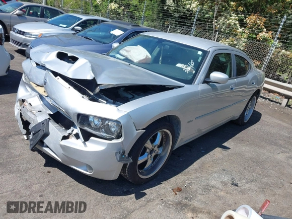 2006 Dodge Charger R/T with VIN 2B3KA53H56H513111, listed as a IAAI auction lot 41977236 with 173,048 mi miles and . Bid and sale history available at carsss.com. Image 2.