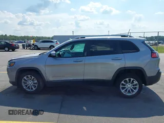 2020 Jeep Cherokee Latitude z VIN 1C4PJLCB3LD615147, wystawiony jako IAAI lot #42569825 z przebiegiem 128 952 mil mil oraz . Historia ofert i sprzedaży dostępna na DreamBid. Obrazek 14.