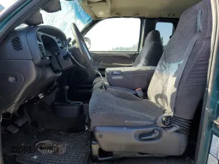 1999 Dodge 2500 z VIN 1B7KF2360XJ585301, wystawiony jako Copart lot #58319385 z przebiegiem 318 952 mil mil oraz Szkoda całkowita • Salvage title. Historia ofert i sprzedaży dostępna na DreamBid. Obrazek 7.