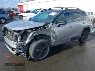 2021 Toyota RAV4 Hybrid XSE with VIN 4T3E6RFV1MU057532, listed as a IAAI auction lot 41713474 with 22,164 mi miles. Bid and sale history available at carsss.com. Image 2.
