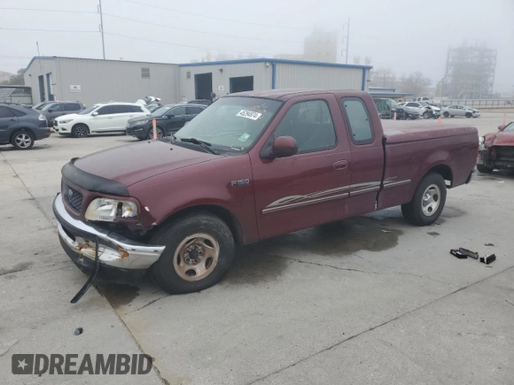 1997 Ford F-150 with VIN 2FTDX1726VCA74811, listed as a Copart auction lot 81909844 with 136,520 mi miles and Salvage title. Bid and sale history available at DreamBid. Image 1.