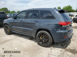 2018 Jeep Grand Cherokee Trackhawk with VIN 1C4RJFN99JC309254, listed as a Copart auction lot 64061615 with 104,558 mi miles and Clean title. Bid and sale history available at DreamBid. Image 2.