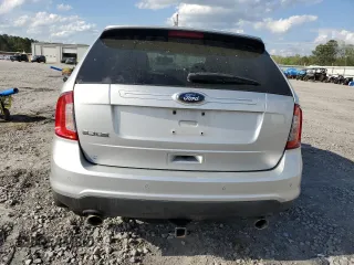 2014 Ford Edge SE с VIN 2FMDK3GC6EBA50349, выставлен на аукционе Copart как лот 49777885 с пробегом 152 895 миль миль и Списание • Salvage title. История ставок и продаж доступна на DreamBid. Изображение 6.