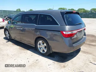2012 Honda Odyssey Touring with VIN 5FNRL5H93CB109394, listed as a IAAI auction lot 42280018 with 190,412 mi miles and . Bid and sale history available at DreamBid. Image 3.
