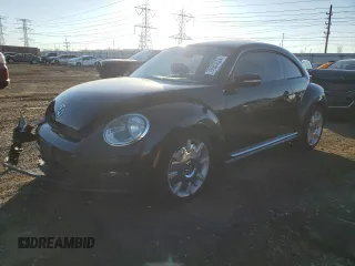 2012 Volkswagen Beetle 2.5L w/Sound/Nav PZEV with VIN 3VWJP7AT4CM629177, listed as a Copart auction lot 79563524 with Not Provided miles and Salvage Title. Bid and sale history available at DreamBid. Image 1.