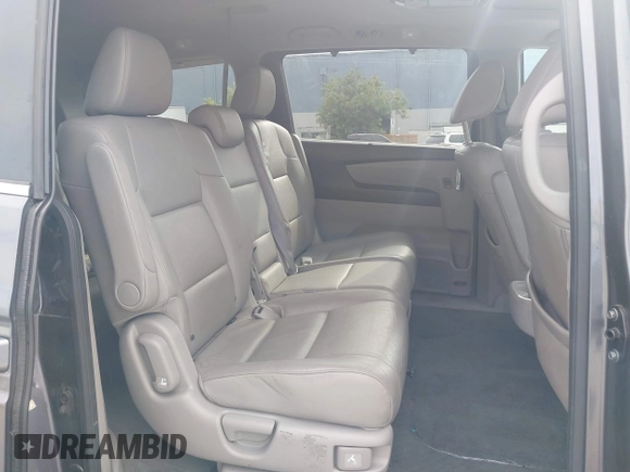 2016 Honda Odyssey EX-L with VIN 5FNRL5H68GB104350, listed as a IAAI auction lot 42023306 with 124,672 mi miles. Bid and sale history available at carsss.com. Image 8.