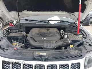 2015 Jeep Grand Cherokee Altitude with VIN 1C4RJEAG2FC901391, listed as a IAAI auction lot 41565763 with 220,685 mi miles. Bid and sale history available at carsss.com. Image 10.