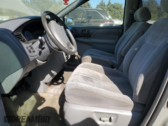 2002 Toyota Sienna LE with VIN 4T3ZF13C52U504138, listed as a Copart auction lot 74633984 with 154,406 mi miles and Salvage Title. Bid and sale history available at carsss.com. Image 7.