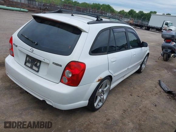 2002 Mazda Protege with VIN JM1BJ245021508764, listed as a IAAI auction lot 42198285 with 237,386 mi miles and . Bid and sale history available at DreamBid. Image 4.