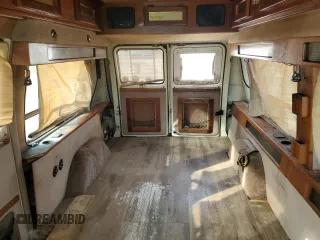 1995 Chevrolet Chevy Van z VIN 1GBEG25K1SF128372, wystawiony jako Copart lot #78600654 z przebiegiem 183 522 mil mil oraz Szkoda całkowita • Salvage title. Historia ofert i sprzedaży dostępna na DreamBid. Obrazek 10.