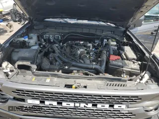 2023 Ford Bronco z VIN 1FMEE5DP0PLA94154, wystawiony jako Copart lot #62035445 z przebiegiem 47 559 mil mil oraz Szkoda całkowita • Salvage title. Historia ofert i sprzedaży dostępna na DreamBid. Obrazek 11.