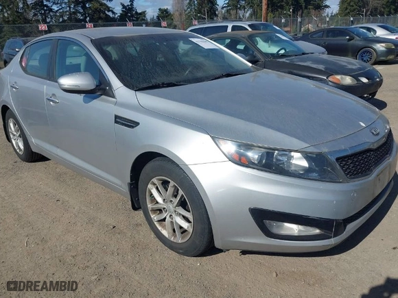 2013 Kia Optima LX with VIN KNAGM4A74D5371383, listed as a IAAI auction lot 41756449 with 133,002 mi miles. Bid and sale history available at carsss.com. Image 1.