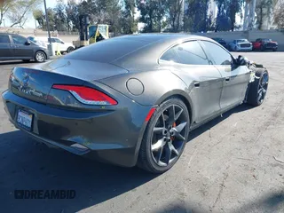 2018 Karma Revero z VIN 50GK41SA4JA000249, wystawiony jako IAAI lot #41865477 z przebiegiem 104 010 mil mil oraz . Historia ofert i sprzedaży dostępna na DreamBid. Obrazek 4.