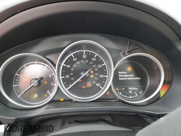 2021 Mazda CX-5 Touring with VIN JM3KFACM7M0334633, listed as a Copart auction lot 51618875 with 70,558 mi miles and Salvage Title. Bid and sale history available at DreamBid. Image 9.