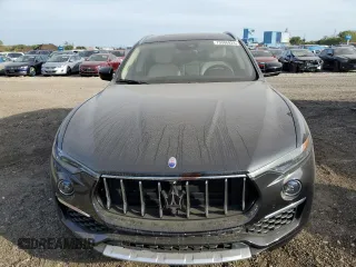 2019 Maserati Levante GranLusso z VIN ZN661XUL8KX337416, wystawiony jako Copart lot #73306924 z przebiegiem 43 891 mil mil oraz Tytuł czysty. Historia ofert i sprzedaży dostępna na DreamBid. Obrazek 4.