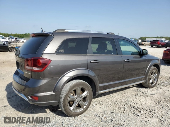 2016 Dodge Journey Crossroad z VIN 3C4PDCGG2GT131628, wystawiony jako Copart lot #56945375 z przebiegiem 126 587 mil mil oraz Szkoda całkowita • Salvage title. Historia ofert i sprzedaży dostępna na DreamBid. Obrazek 3.