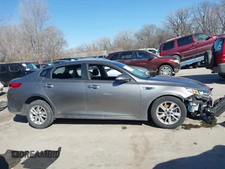 2017 Kia Optima LX with VIN 5XXGT4L30HG145178, listed as a IAAI auction lot 41773857 with 119,191 mi miles and . Bid and sale history available at DreamBid. Image 14.