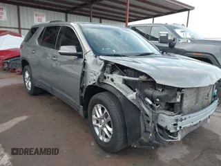 2018 Chevrolet Traverse LT Cloth z VIN 1GNERGKW9JJ173766, wystawiony jako IAAI lot #41336426 z przebiegiem 108 910 mil mil oraz . Historia ofert i sprzedaży dostępna na DreamBid. Obrazek 14.
