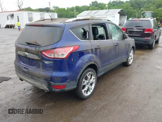 2016 Ford Escape Titanium with VIN 1FMCU9J95GUB65432, listed as a IAAI auction lot 42503176 with 96,362 mi miles and . Bid and sale history available at DreamBid. Image 4.