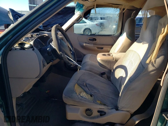 1999 Ford F-150 с VIN 1FTRX18W7XNA31048, выставлен на аукционе Copart как лот 87051164 с пробегом Не указан миль и Списание • Salvage title. История ставок и продаж доступна на DreamBid. Изображение 7.