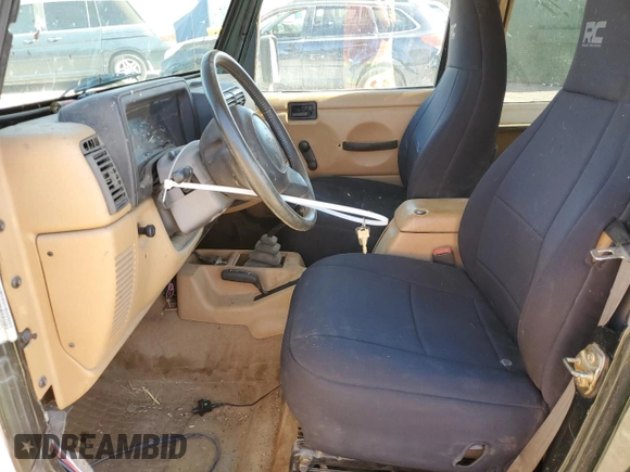 1997 Jeep Wrangler Sahara with VIN 1J4FY49S6VP521988, listed as a Copart auction lot 80753494 with 99,909 mi miles and Salvage Title. Bid and sale history available at carsss.com. Image 7.