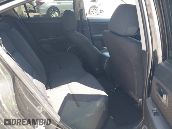 2007 Mazda 3 s Touring with VIN JM1BK323571631973, listed as a IAAI auction lot 41990310 with 287,946 mi miles. Bid and sale history available at carsss.com. Image 8.