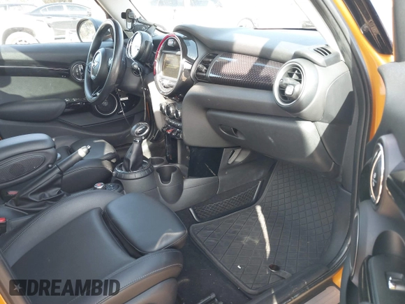 2015 MINI Hardtop 4 Door S z VIN WMWXU3C51F2B57061, wystawiony jako IAAI lot #41691431 z przebiegiem 66 406 mil mil oraz . Historia ofert i sprzedaży dostępna na DreamBid. Obrazek 5.